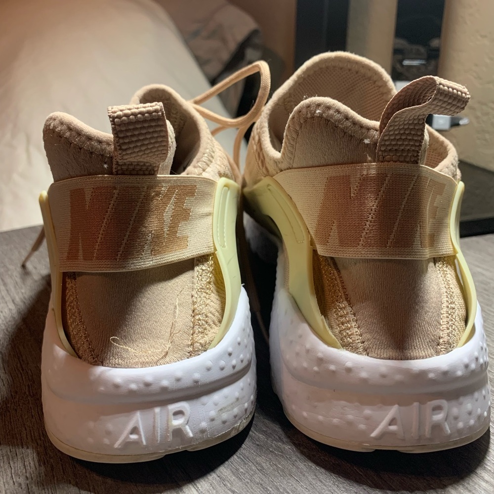 Peach colored Nike shoes, size 8. Worn only once